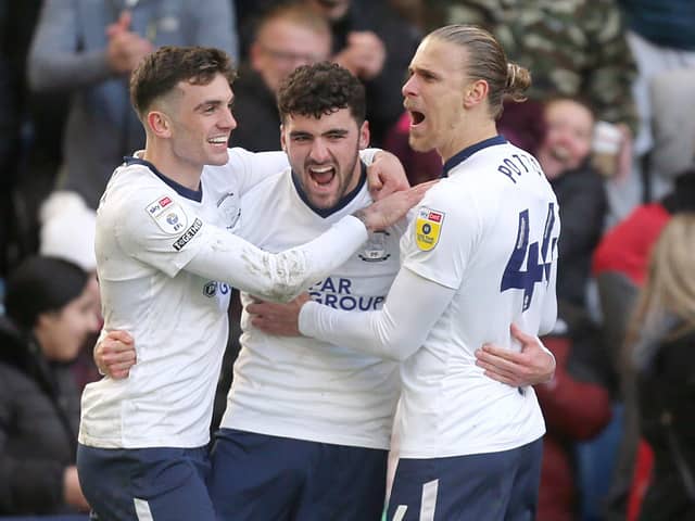Preston North End's Tom Cannon celebrates scoring with Troy Parrott (left) and Brad Potts (right)