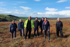 Group photo of key partners from Lancashire's peatland project including County Councillor Shaun Turner (third from left) and Trudy Harrison MP (second from right)