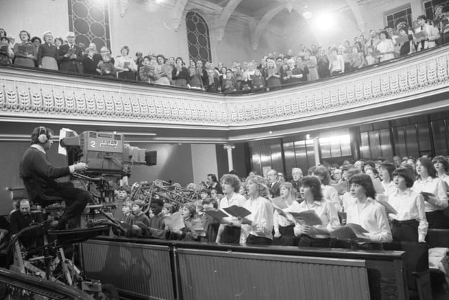 BBC TV's Songs of Praise from the Central Methodist Church, Lune Street, Preston in 1981. A choir of 240 and a congregation of 400 drawn from the town centre churches joined at the church for filming while outside cameras filmed various aspects of Preston