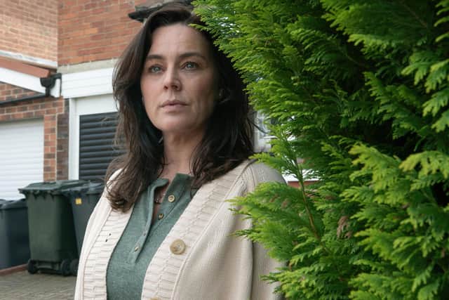 Emma (Jill Halfpenny) spends a lot of time lurking behind bushes in the new Channel 5 drama The Feud (Picture: Channel 5)
