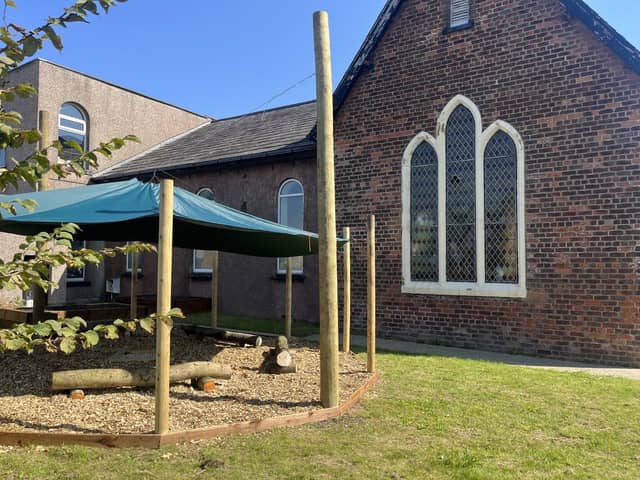 Hope community hub with the new outdoor shelter
