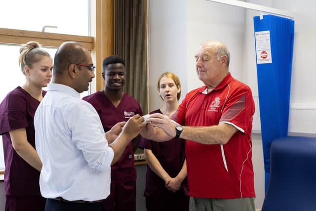 Volunteer Bill Dooley with a group of UCLan physician associate students