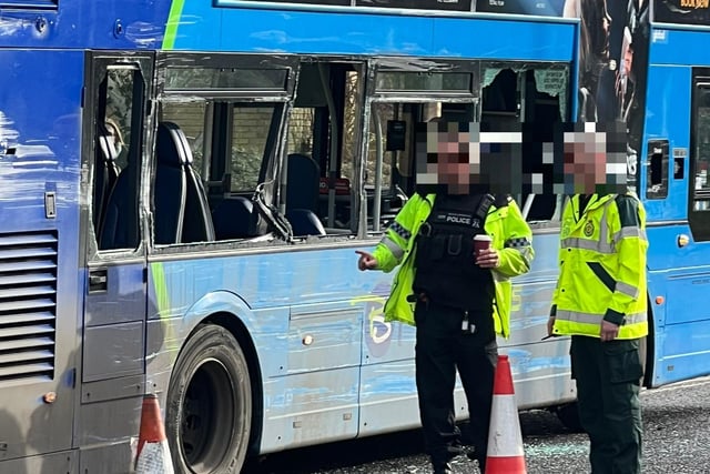 The HGV struck the side of the bus, leaving a number of its windows smashed