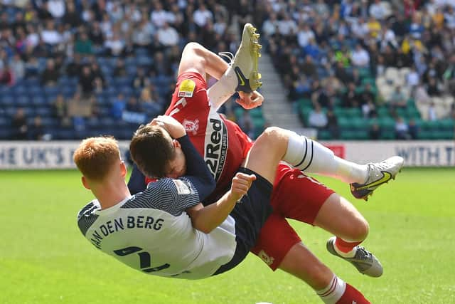 Preston North End's Sepp van den Berg battles with Middlesbrough's Paddy McNair