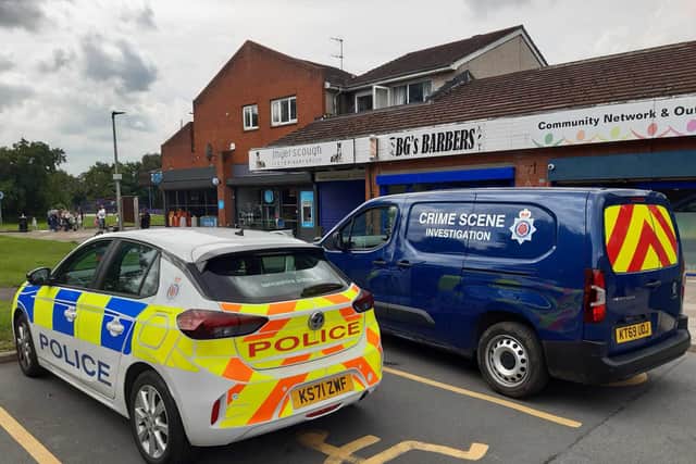 Police and CSI at the scene of the stabbing near the Co-op store in Dunkirk Lane, Moss Side, Leyland on Wednesday, July 26