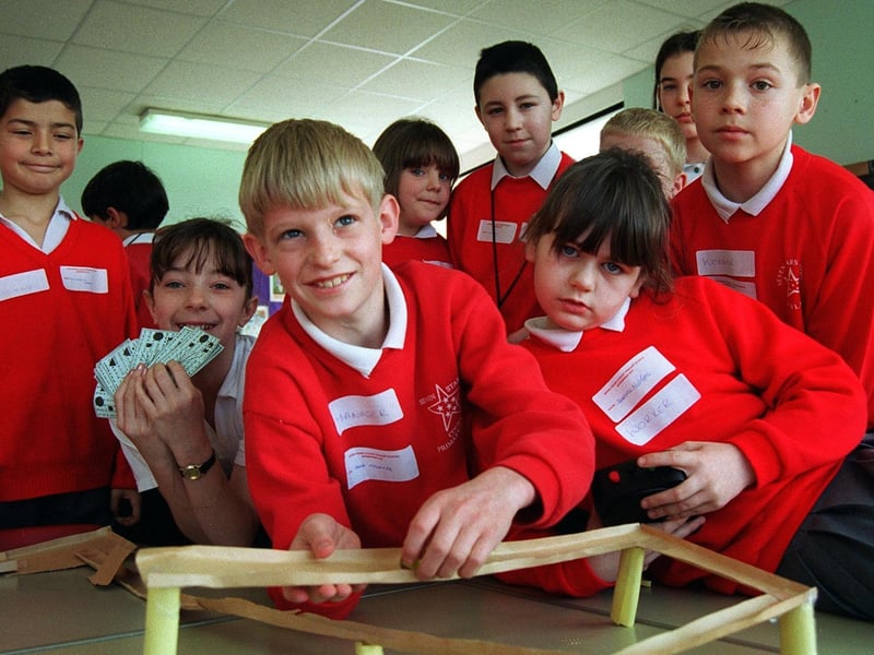 Pupils at Leyland's Seven Stars County Primary School, Oliver McConnie and Jeanine Nelson, doing a time experiment during an enterprise day at the school