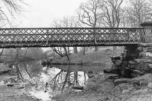 The condemned bridge over the Serpentine Lake in Moor Park, Preston. The bridge had fallen into disrepair was to deemed to be too costly to fix, so it was set to be removed before the Preston Guild in 1992
