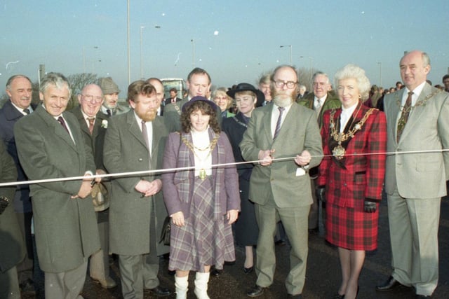 A long awaited bypass was officially opened - almost five months ahead of schedule. Local schoolchildren and residents watched as the chairman of Lancashire County Council's highways and transport committee Coun George Slynn cut the ribbon to open the new Kirkham and Wesham Bypass near Preston. Speeches were made by the Mayor of Fylde Coun Eileen Hall, the Mayor of Wesham Coun Linda Nulty, the Mayor of Kirkham Coun David Armer, and Coun Slynn himself