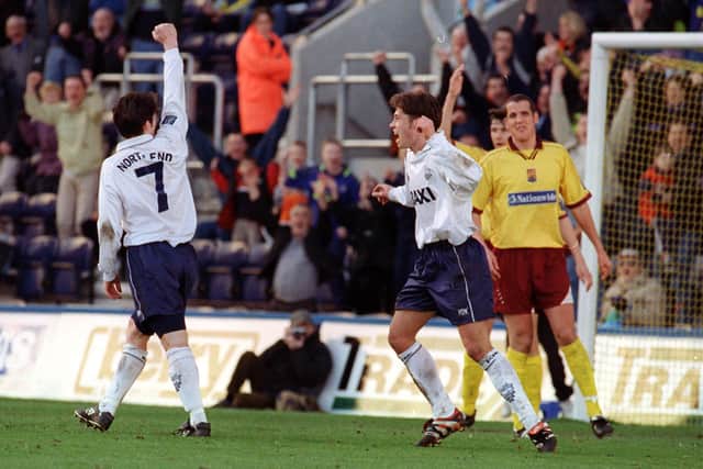 Jonathan Macken and Steve Basham celebrate Preston North End's third goal against Northampton Town at Deepdale in March 1999