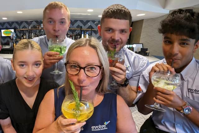 Evolve Document Solutions staff take the new gin glasses for a test drive