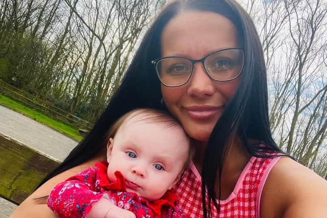 Kiena Dawes, 23, with her daughter Marnie, who is now 9-months-old