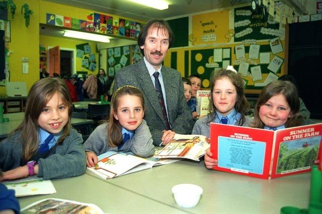 Our Lady and St. Gerards RC School, Lostock Hall, Preston, had a favourable OFSTED report in 1997. The head teacher Bernard Walmsley is pictured here with (from left) Sophie Nisbet, Hannah Christian, Jessica Littlefair and Lauren Barnard
