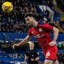 Preston North End's Andrew Hughes heads clear (photo: Andrew Kearns/CameraSport)