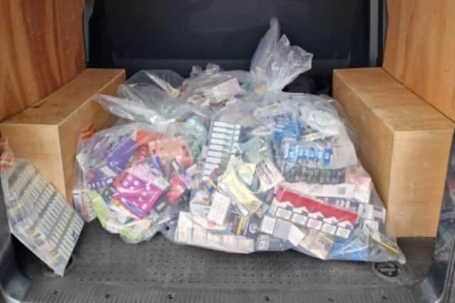 1,228 illegal tobacco products including cigarettes and vapes were seized from two shops in Preston (Credit: Lancashire Police)