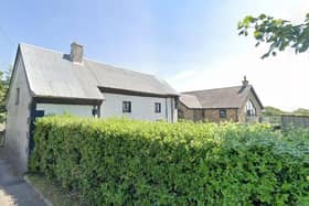The white cottage-style property at Bourne Brow Farm should have been demolished before the new dwelling behind it was built in 2011 - but now it can remain (image: Google)