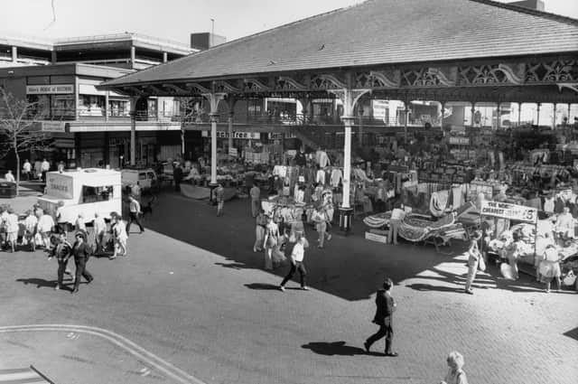 The bustling covered market in Preston, pictured in the 80s