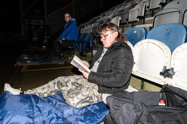 Jack Williams brought a book along to kill the time at the Big PNE Sleep Out. Photo: Kelvin Lister-Stuttard