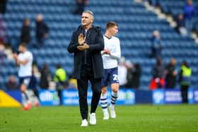 Preston North End manager Ryan Lowe leaves the field after the match.