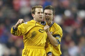 Eddie Lewis is congratulated by captain Graham Alexander after scoring for Preston against Sunderland in 2004 (Photo by Stu Forster/Getty Images)