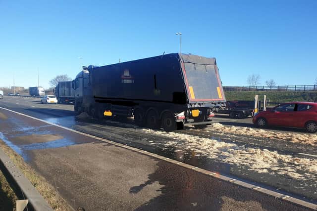 A HGV shed some of its cargo of sawdust after braking heavily to avoid a collision on the M6 in Preston this morning (Tuesday, March 7)