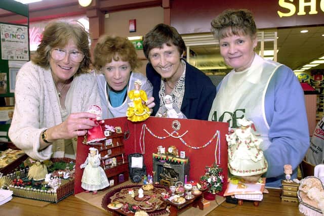 Members of the Rainbow centre Dolls House and Miniatures Club from Morecambe put on a display in the Arndale centre in aid of Age Concern (left to right) Janet Guffog, Renee Smith, Barbara Vollands, and Helen Huntington. This picture was taken in 2001.