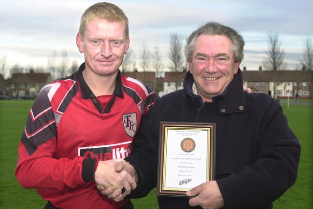 West Lancashire League Premier Division team of the month Freckleton FC. Pictured: Captain Paul Danson receives an award for being Asda Logic Team of the month from league rep Stuart Rowe