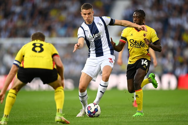 WEST BROMWICH, ENGLAND - AUGUST 08: Conor Townsend of West Brom gets past Tom Cleverley and Hassane Kamara of Watford during the Sky Bet Championship between West Bromwich Albion and Watford at The Hawthorns on August 08, 2022 in West Bromwich, England. (Photo by Gareth Copley/Getty Images)