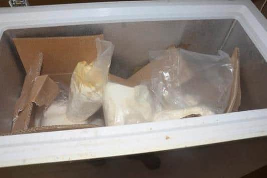 Police found £480,000 of cocaine inside a locked safe box as well £353,000 of amphetamine inside a freezer. (Credit: Lancashire Police)