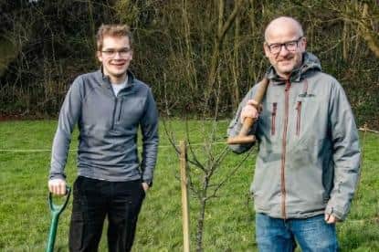 Oliver Atkinson and Shaun Turner planting the trees
