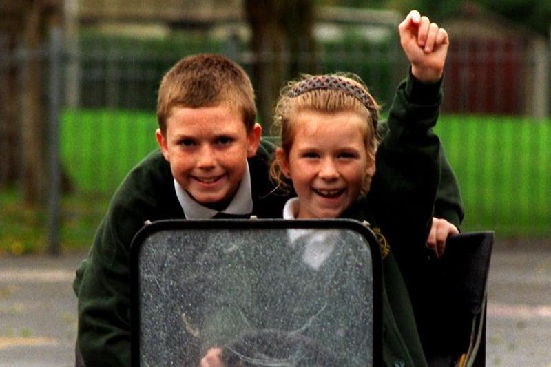 Ian and Heather Wilson, pupils of Greenlands County Primary School, Preston with a car made by their father