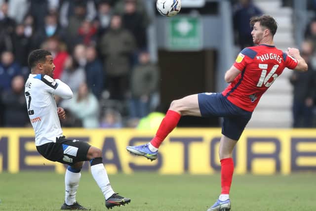 Derby County's Nathan Byrne challenges Preston North End defender Andrew Hughes