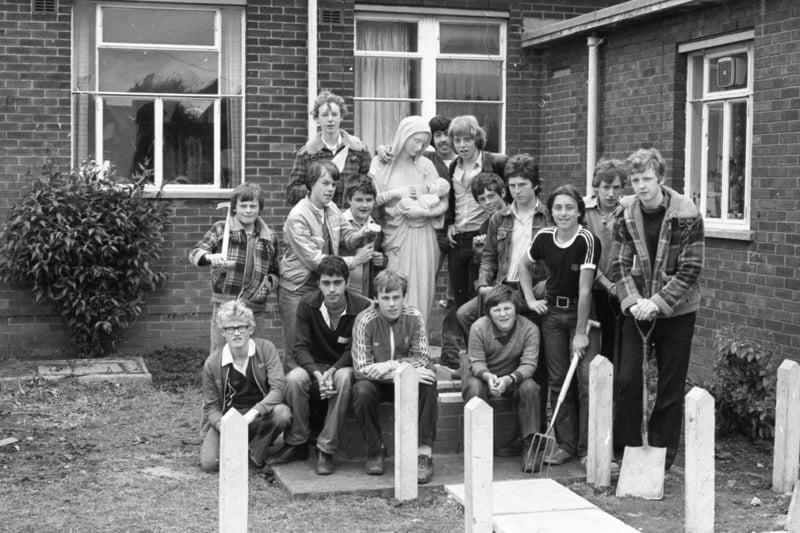 These lads have put the Madonna and Child on a pedestal - literally. They have spent the last few weeks working on a foundation course in... religious and building studies! For the boys, from St Mary's High School at Bamber Bridge, have designed and built the brick pillar and paving to show off the stone carving. The project was part of a construction course scheme for fourth-year pupils
