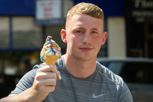 Sean Ince cools down with an ice cream in Preston City Centre