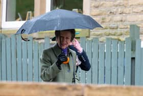 Princess Anne arrivals at the Trawden Arms and greets the public who had waited in the rain to meet her. Photo: Kelvin Lister-Stuttard