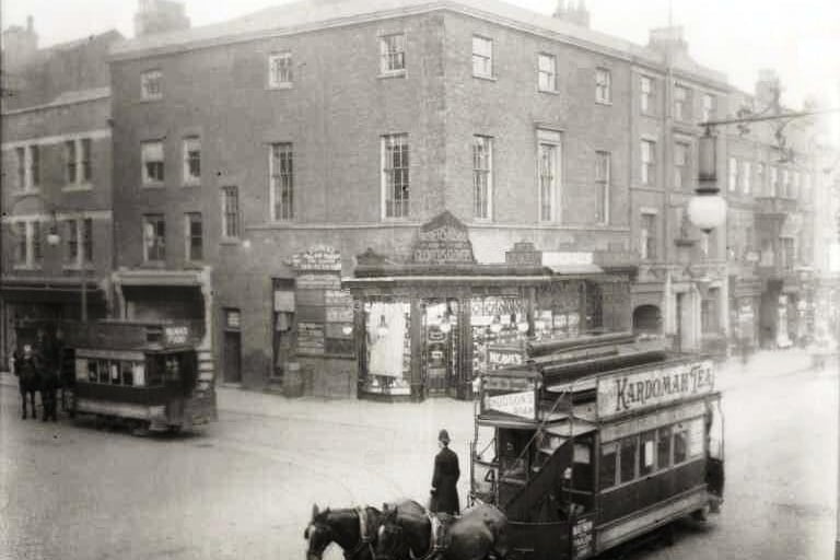 Church St. & Lancaster Rd. Preston 1896
Horse drawn trams at the corner of Lancaster Road and Church Street in 1896.
Also seen is Starkies shop on the corner and the Red Lion Hotel a little further down on Church Street. Kardomah Tea must have been a popular drink of the day as it appears on many of the horse drawn trams of that era. The Kardomah Cafe would eventually occupy the old post office premises on Fishergate after the new facility opened at the Market square in 1903. Kardomah cafes were found in most major towns and cities and were the Starbucks of their day. The company lasted through to the late 1960's. Their coffee bean roasters used to vent directly into the street and it was hard to resist popping in for a cup freshly brewed coffee. The first electric tram did not appear on Preston's streets until 1904.