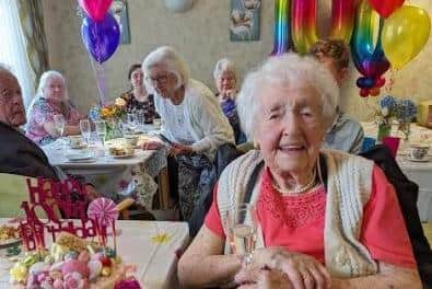 Edna Stringer enjoying her 100th birthday party