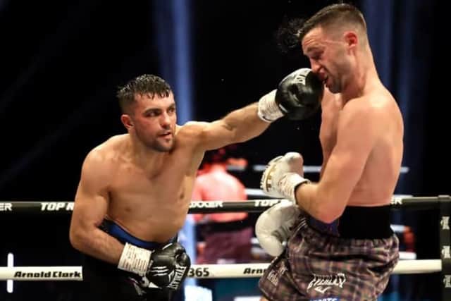 Jack Catterall lands a left hand on Josh Taylor during their epic fight in February