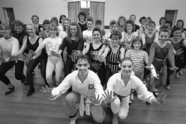 Step to it! Old Boy Richard Cuerden showed members of the Saunders Jones Dance School how it's done. Preston-born Richard, who is currently starring in the musical 42nd Street at Manchester Opera House, was invited back to the school where he learnt his first steps. Richard - and his leading lady Jenna Ward - called in at the St John's Church Hall in Broughton, Preston, and led members of four schools through a few moves