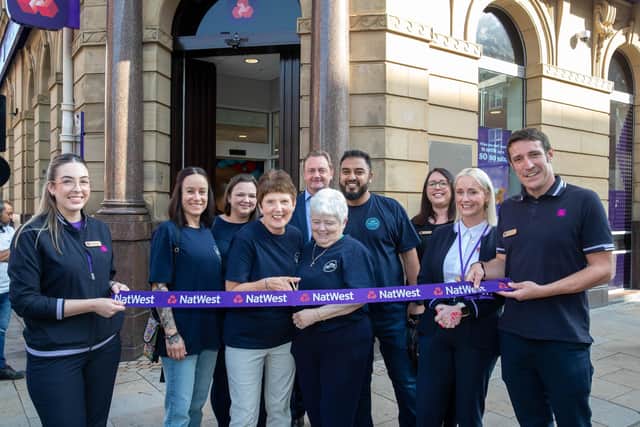 Volunteers from Preston Community Hub officially open the new NatWest banking hub in Preston along with staff and members of the bank’s North Regional Board