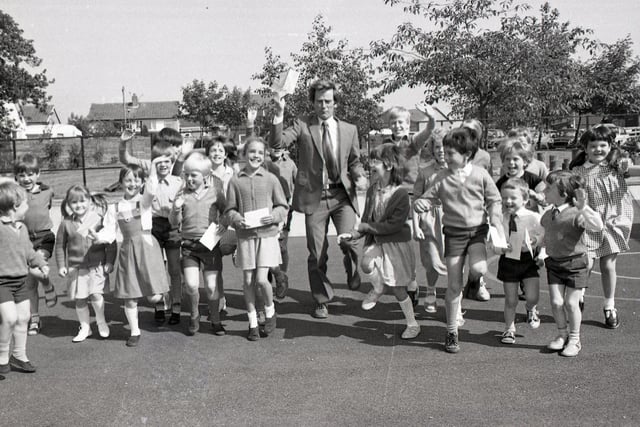 Youngsters from St Peter's School in Fulwood, Preston struck up a good charity fund-raising deal with their teacher and scout master David Simpson... They collected the sponsors while he ran a gruelling 26 miles around the street of the capital during the London Marathon