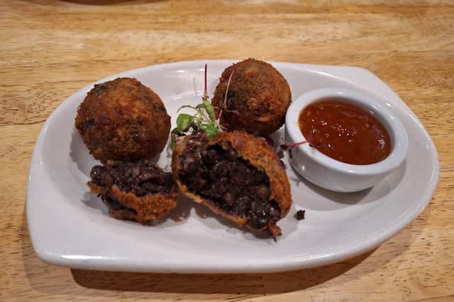 Black pudding, smoked cheese and bacon bon bons served with sweet chilli dipping sauce at the Four Alls Inn, Higham