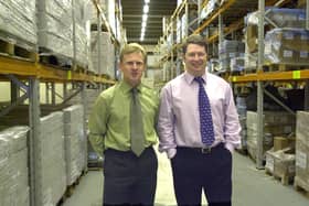 The joint Managing Directors of PSL Print Management, Brian Eyre and Jim Gilliland, pictured in 2001 in the company's warehouse in Preston
