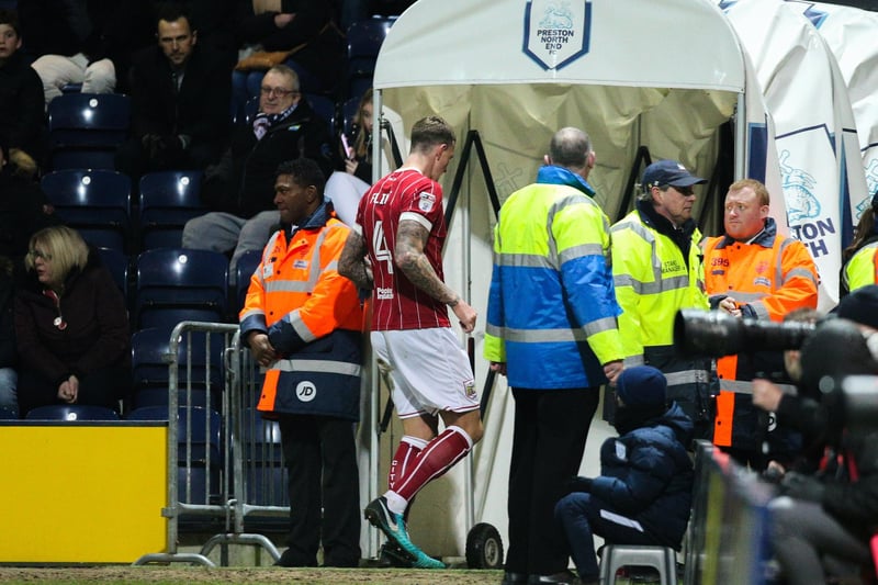 Bristol City's Aden Flint leaves the field after being shown a red card