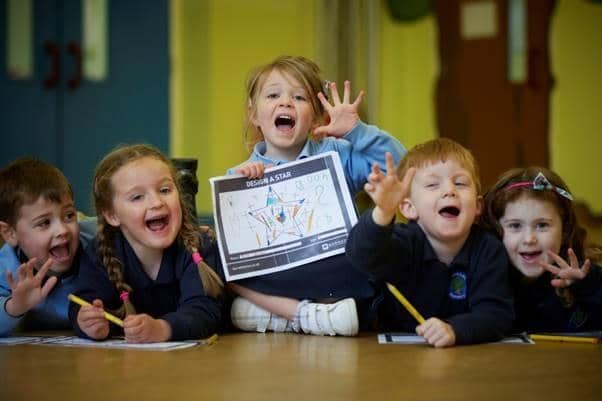 Pupils of Alston Lane Nursery with their Five Star drawings, part of a competition organised by Barratt Homes.