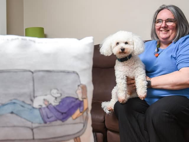 Artist Andrea Selley at home in Kirkham with her dog Rafi who features in her work