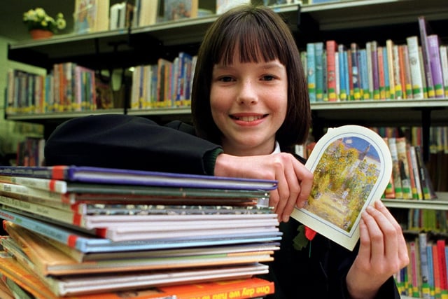 Rachel Stribbling, 12, a pupil at Broughton High School, near Preston, with the voucher she received for reaching the finals of 'The Big Idea' poster competition