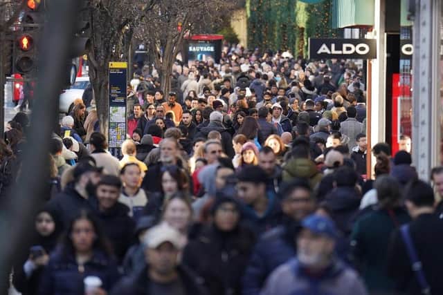 Boxing Day has traditionally been a day of sales where town centres become packed with shoppers out to grab a bargain (Credit: James Manning/ PA)