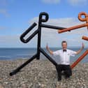 Sculptor Anthony D Padgett with Tyson Fury and Anthony Joshua at Morecambe Bay. Picture by Anthony Padgett.