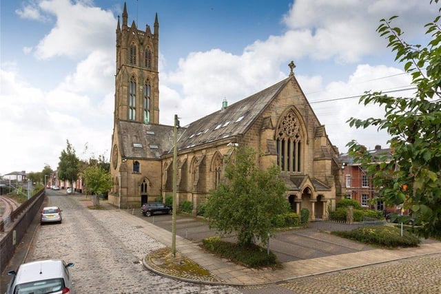 This self-contained apartment in converted church boasts original beams and open stone work, a kitchen with integrated oven,  a lounge area with stunning views across the city and beyond, a three-piece bathroom, and spacious bedrooms. Marketed by Michael Bailey Estate Agent, Powered by Keller Williams, Preston, 29 Manor Avenue, Penwortham, Preston PR1 0XH. Call: 01772 382181