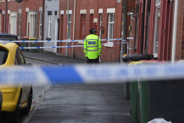 Police at the scene of the double stabbing in Shelley Road, Ashton on Friday, April 14. Picture by Neil Cross / Lancashire Post